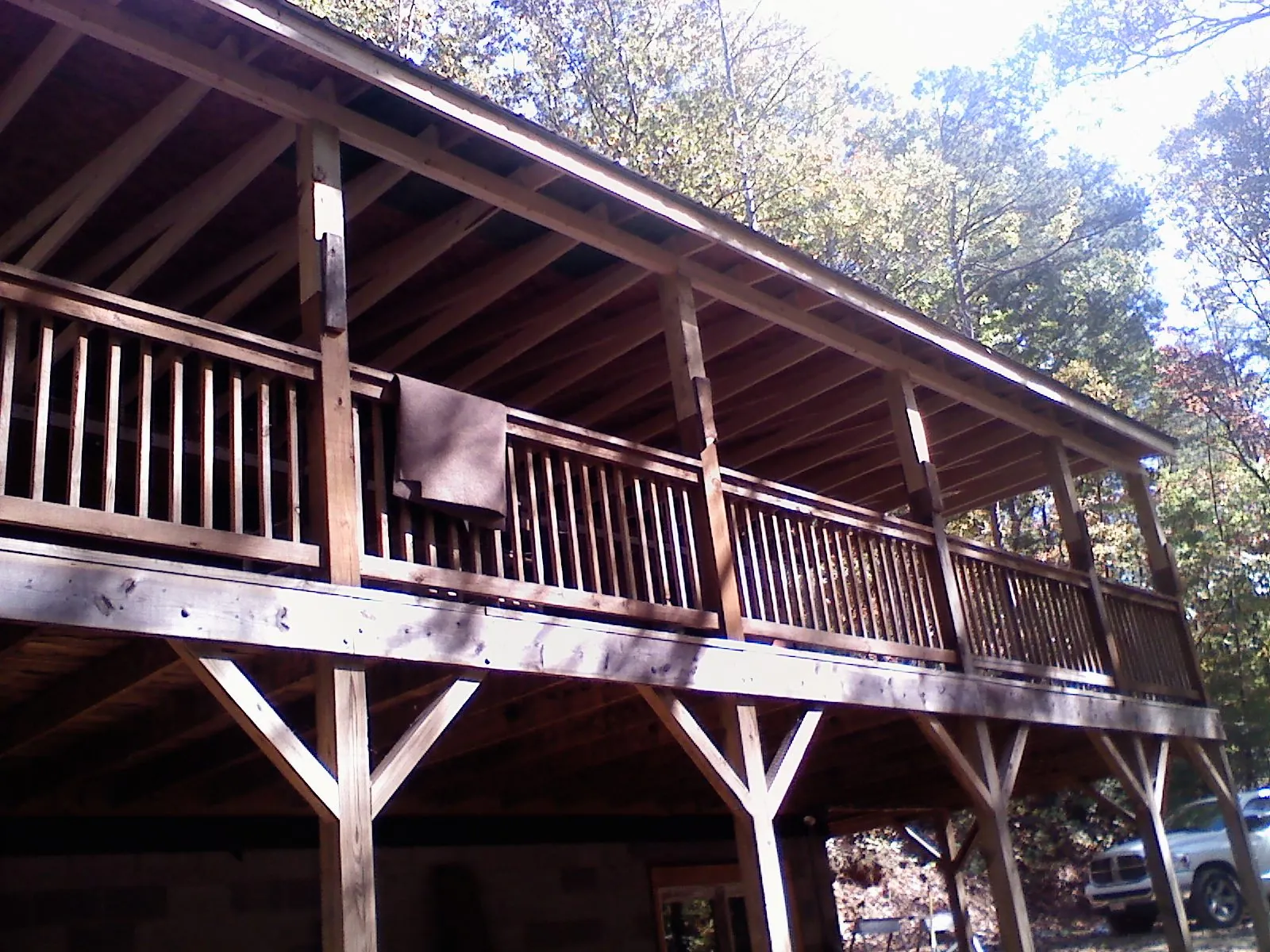 Timber framing under a new elevated porch and deck in Buckhannon